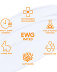 Close-up of a sunscreen texture showing icons for water resistance, cruelty-free, and reef-friendly certifications, alongside EWG rating and free from harmful chemicals claim.