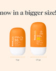 Two bottles of thinkdaily sun serum with text indicating a bigger size comparison on a beige background.