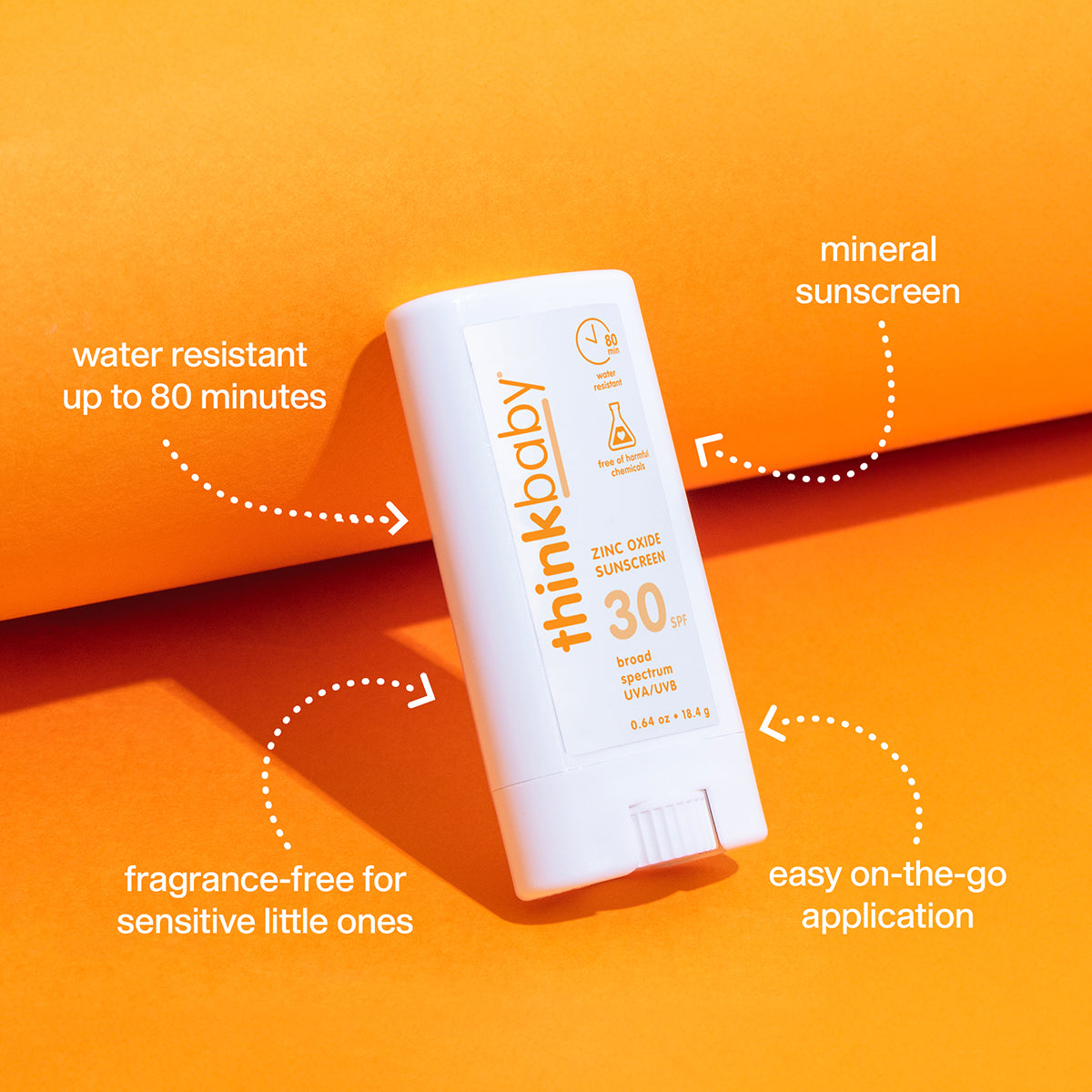 Thinkbaby SPF 30 mineral sunscreen stick on bright orange background highlighting water resistance, fragrance‑free formula, and easy on‑the‑go application.
